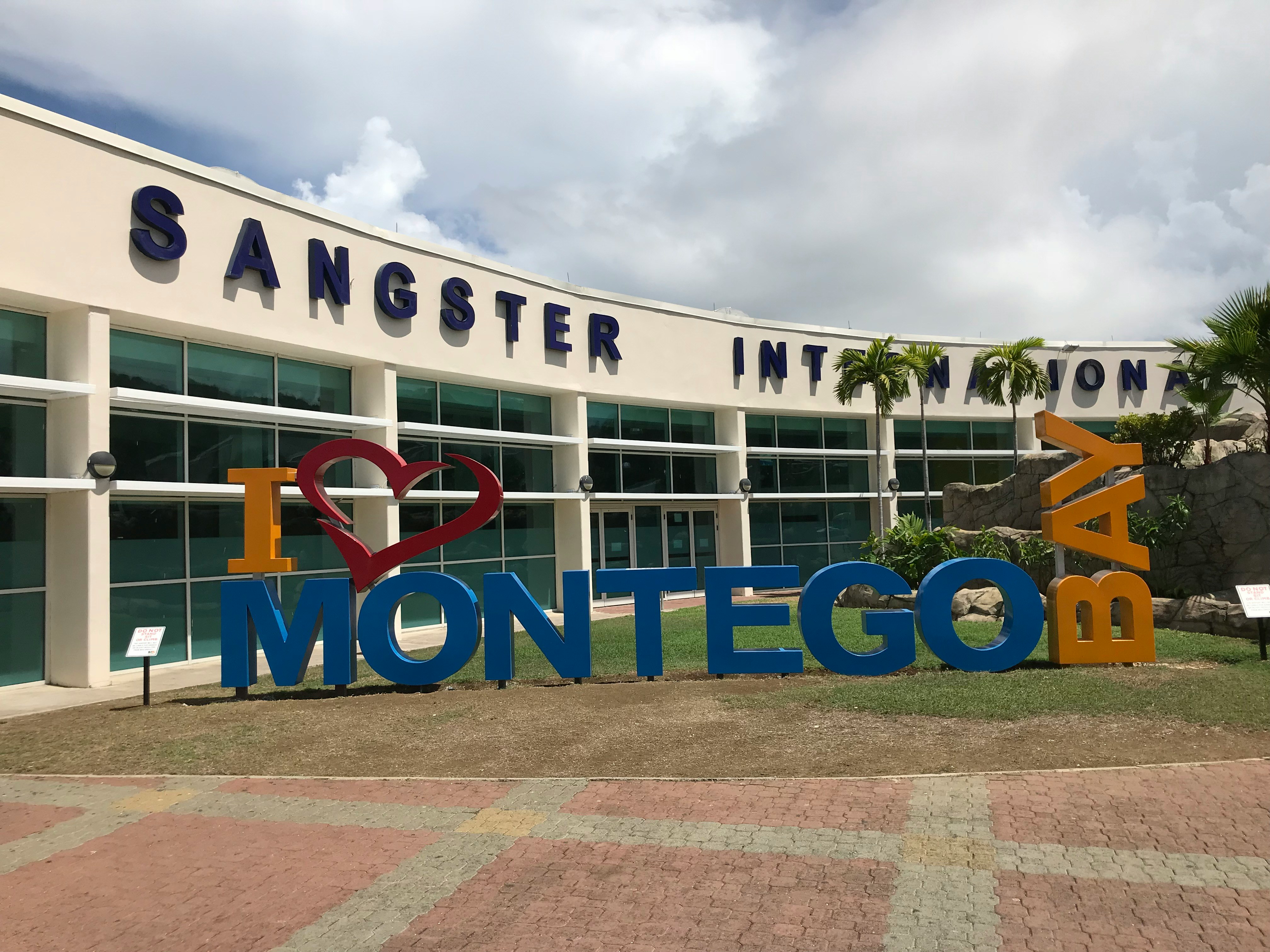 Image of the sign outside of Sangster International Airport in Montego Bay, Jamaica